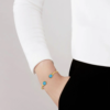 Cabochon flexible bangleBlue opalescent crystal, 18K yellow gold-plated - Image 2